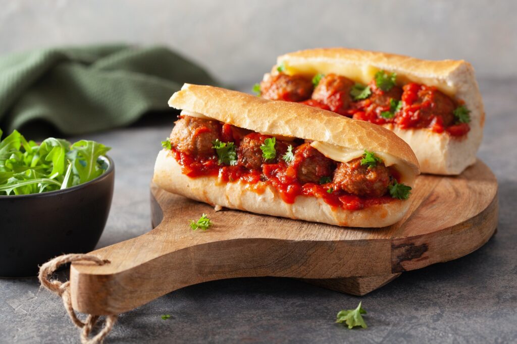urban subs sandwich with cheese and marinara tomato sauce. american italian fast food